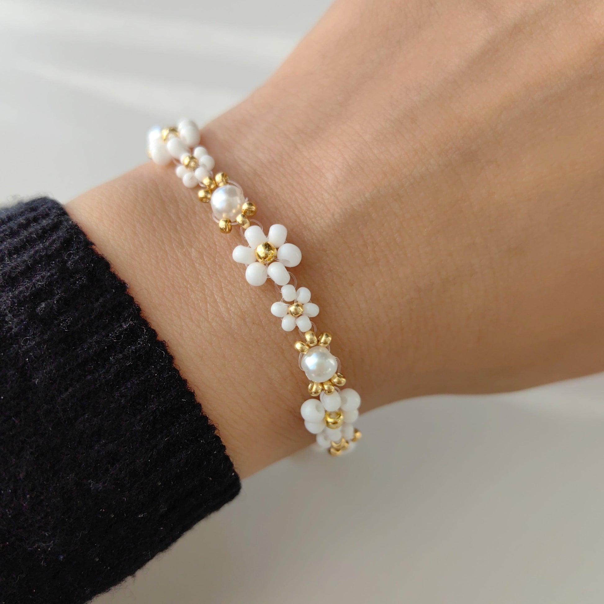 Cloud Pearl Bracelet worn on wrist, handmade white seed bead freshwater pearl bracelet
