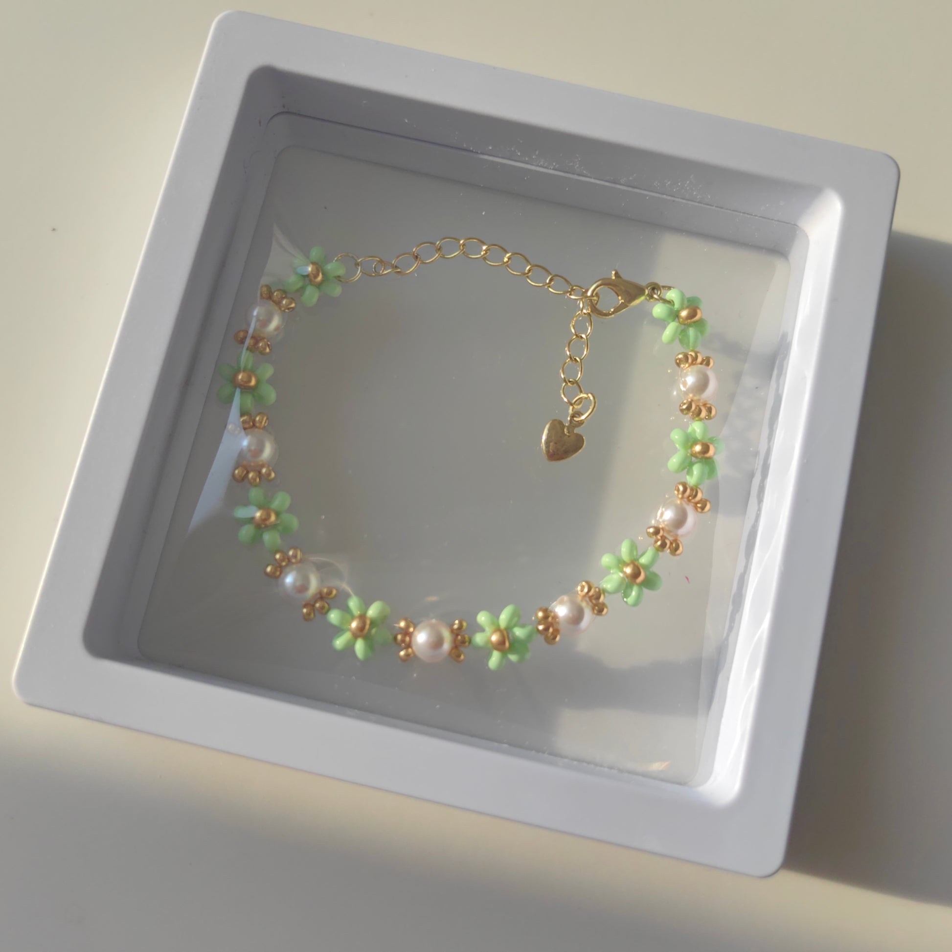 Green Pearl Blossom bracelet with pearls and seed beads in jewelry box