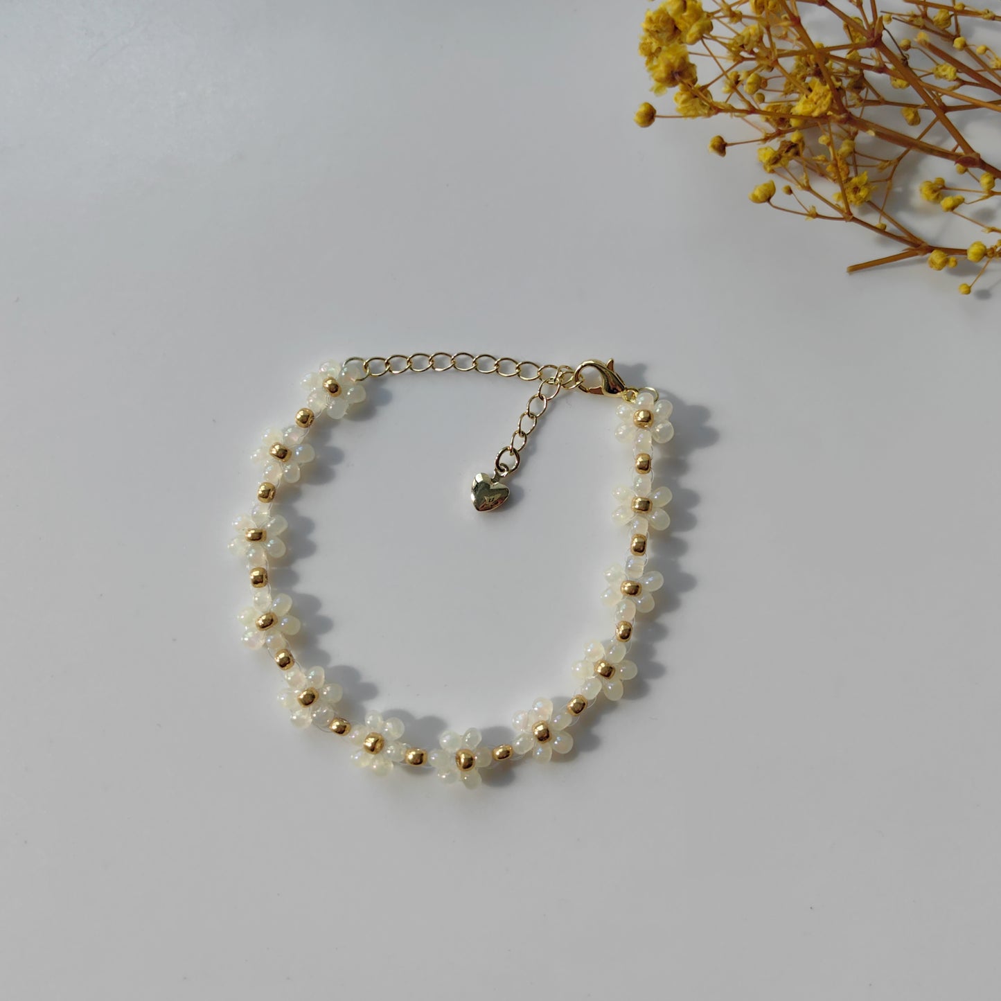 Lotus Bead Bracelet on white background, handmade and elegant