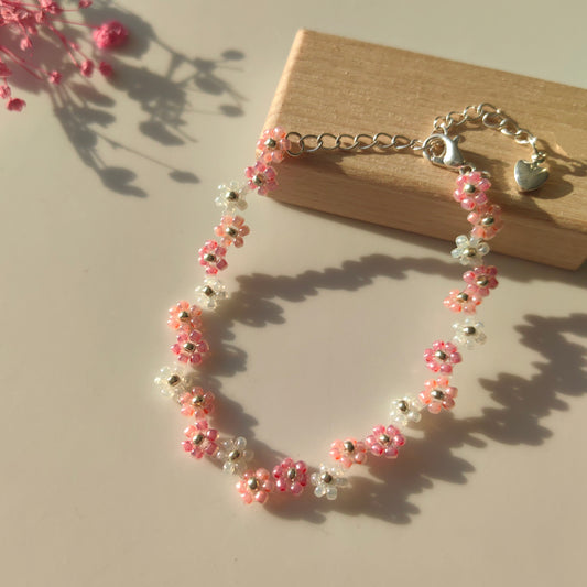 Zigzag Fairy Bracelet displayed on wood, pink and white seed bead handmade bracelet